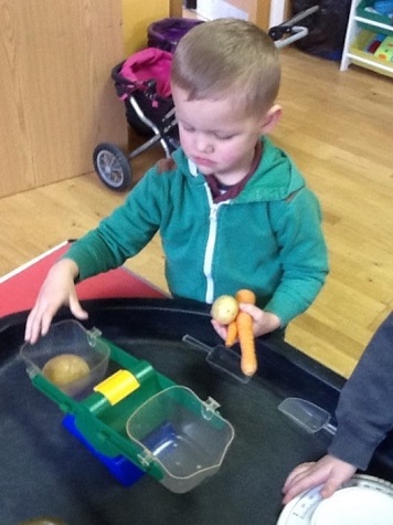 Boy using scales